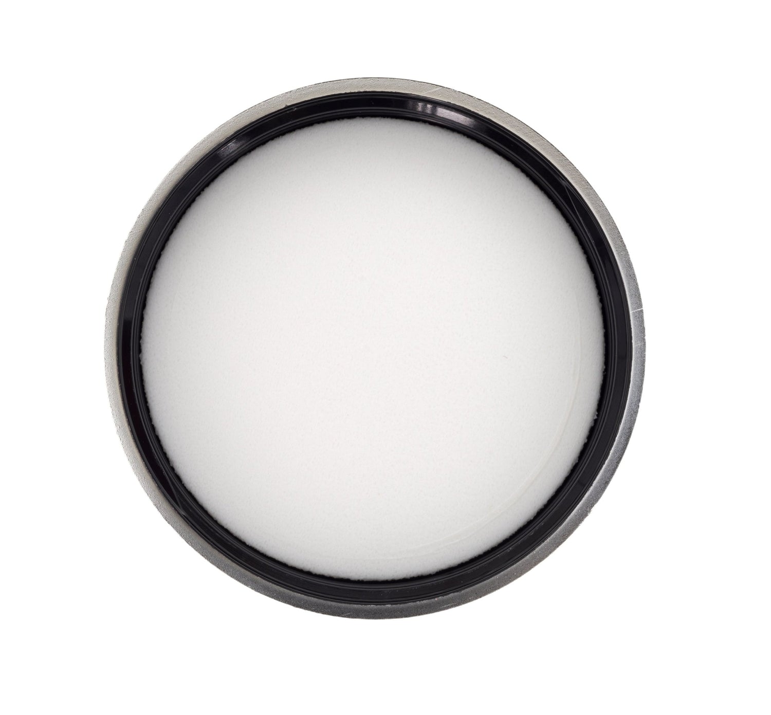 Round white object with metallic rim on a white background