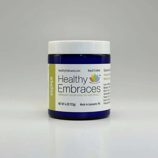 Healthy Embraces Deeper Comfort Cream 4oz jar, soothing skincare cream with a smooth texture for deep comfort.