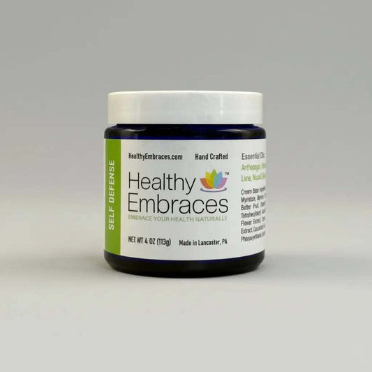 Healthy Embraces 4oz self-defense cream in a small jar, natural skincare product for personal protection and skin care.