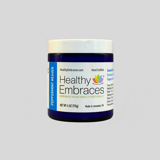 Healthy Embraces Peppermint Heaven Cream in 4oz lotion bottle, showing the label and smooth cream texture.