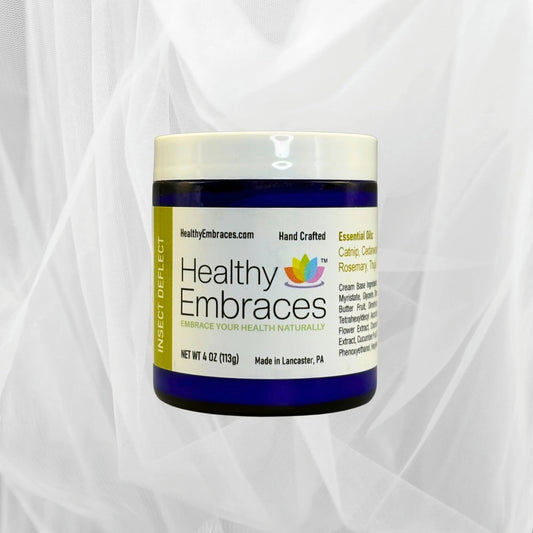 Healthy Embraces Insect Deflect Cream in a jar, showcasing a soothing skincare cream for insect protection.