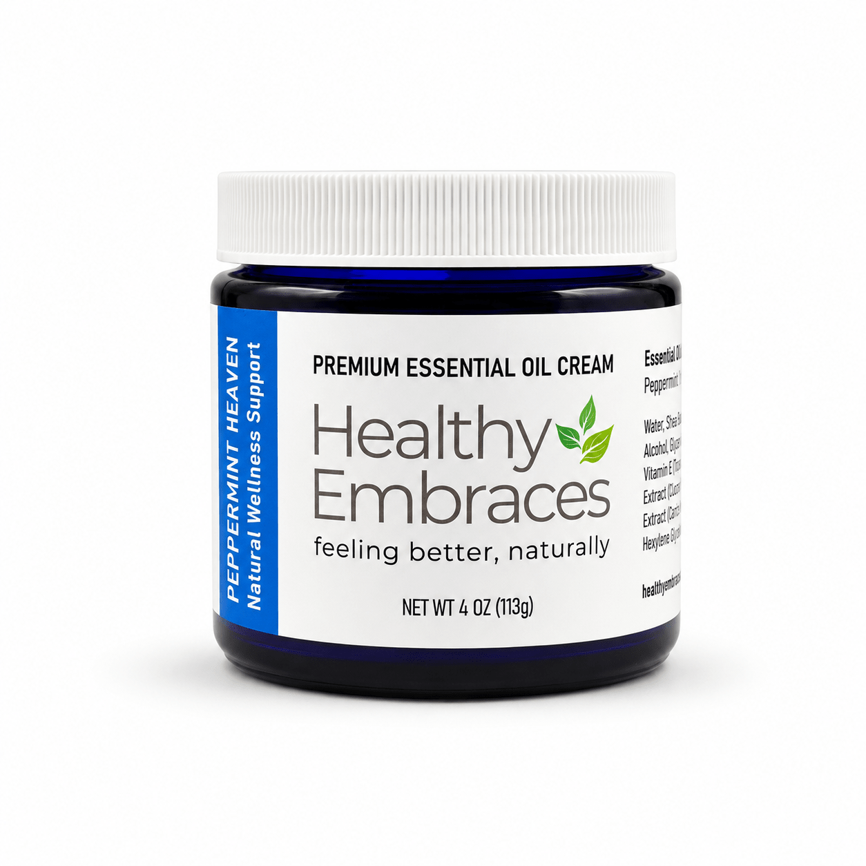 Healthy Embraces Peppermint Heaven Cream jar showing the creamy texture and peppermint leaves on the label.