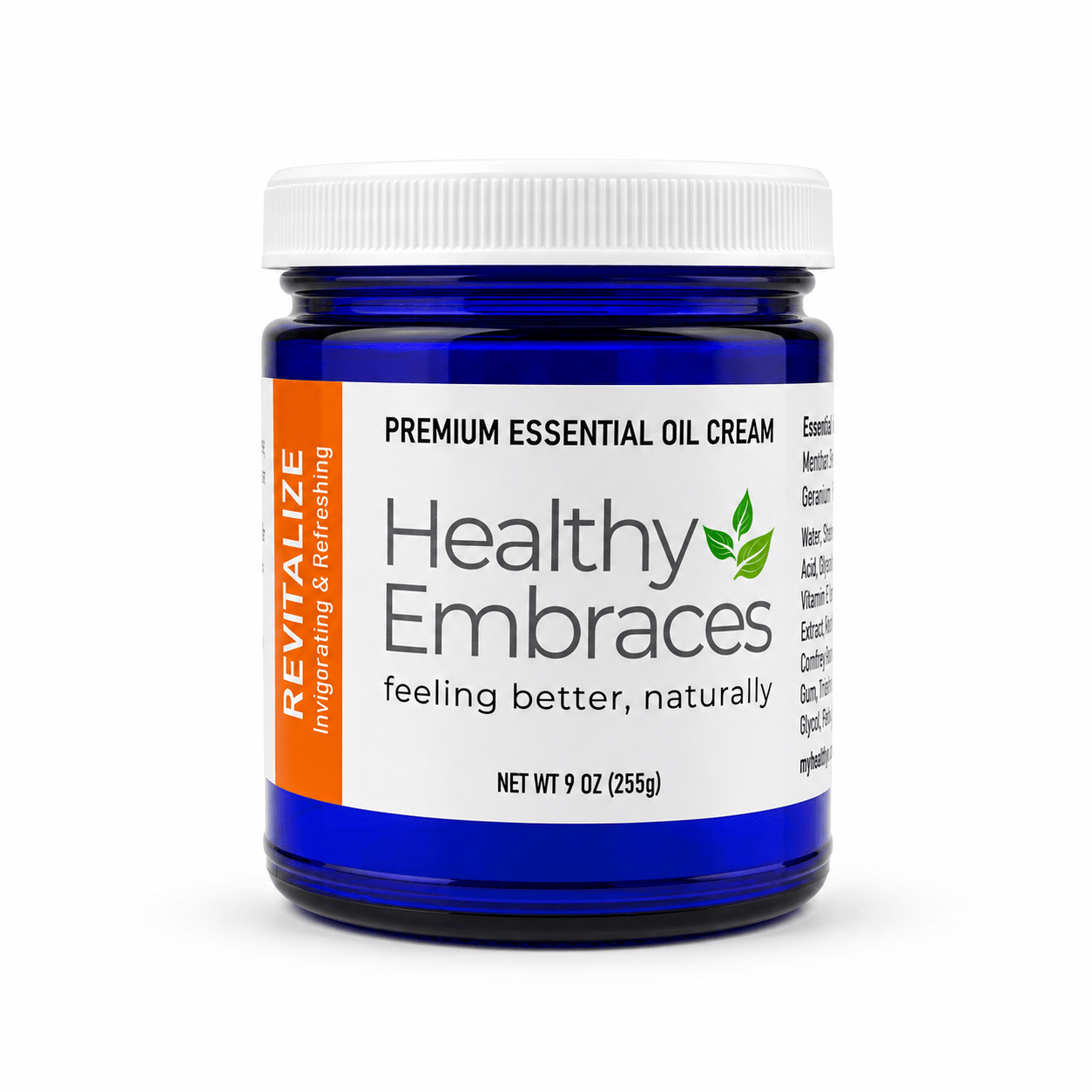 Healthy Embraces Revitalize Cream jar showing smooth, creamy texture and vibrant label for revitalizing skincare.
